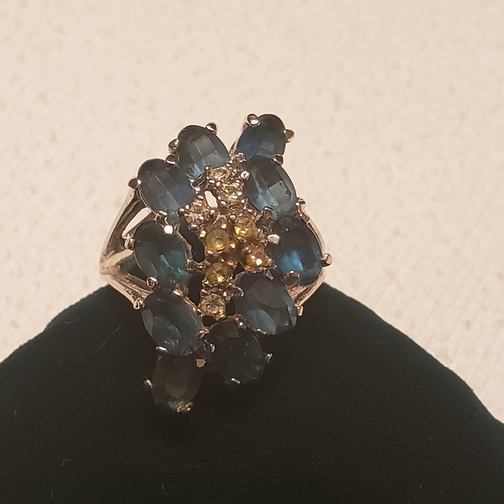 Blue and white stone 18 k gold electra plate ring.
